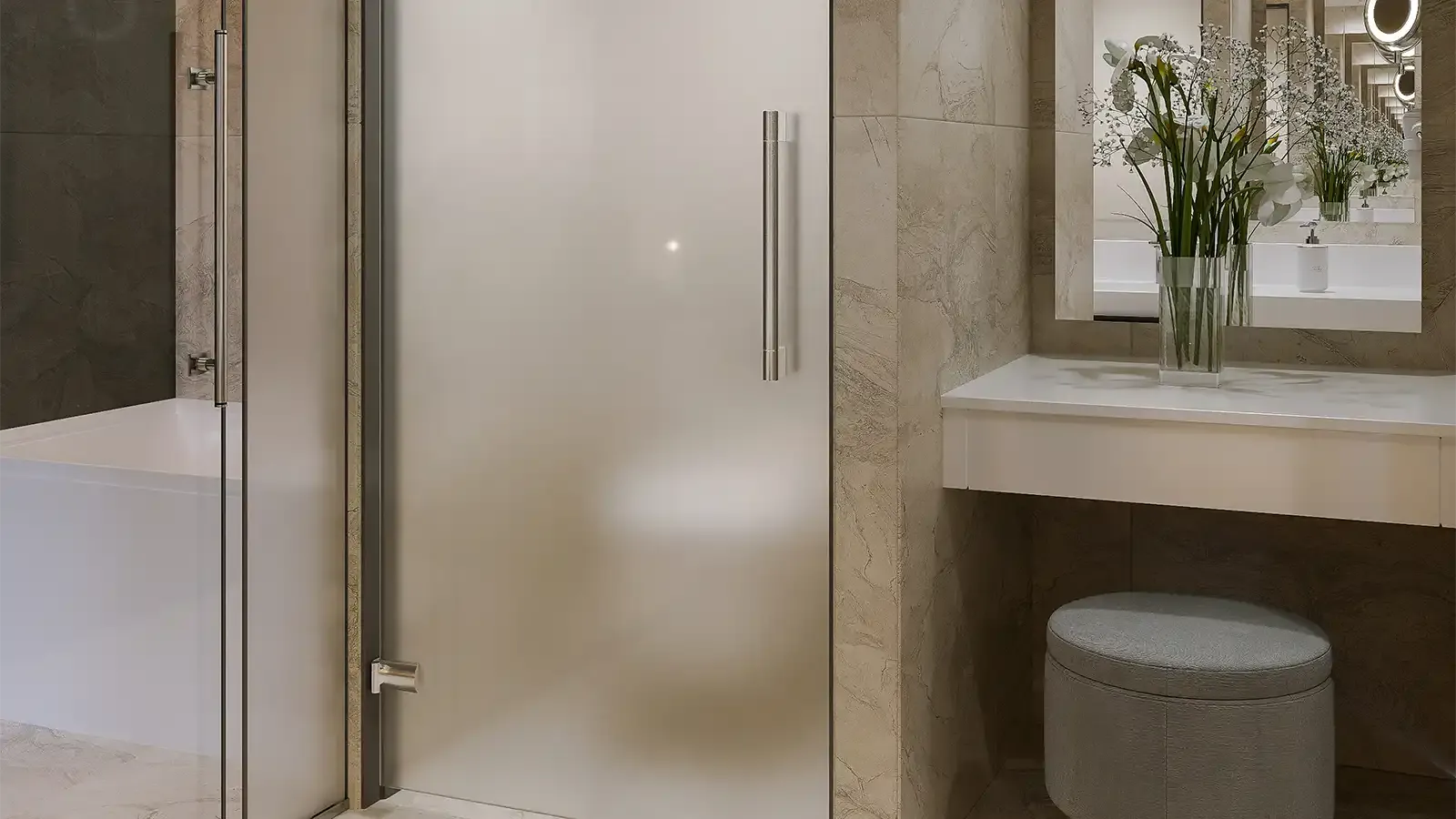 The shower, tiled floor to ceiling
